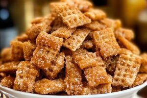 Enjoy the sweet crunch of Caramel Churro Chex Mix! This delightful snack features a perfect blend of crispy Chex cereal coated in creamy caramel and dusted with cinnamon sugar. It's an easy-to-make treat that’s perfect for parties or movie nights. Don't miss out on this delicious recipe! Save this pin for your next snacking adventure!